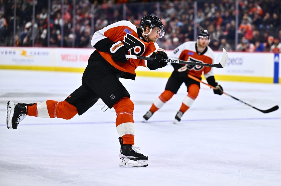 Mar 12, 2024; Philadelphia, Pennsylvania, USA; Philadelphia Flyers defenseman Travis Sanheim (6) shoots against the San Jose Sharks in the first period at Wells Fargo Center. Mandatory Credit: Kyle Ross-USA TODAY Sports