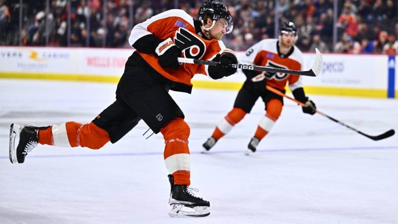 Mar 12, 2024; Philadelphia, Pennsylvania, USA; Philadelphia Flyers defenseman Travis Sanheim (6) shoots against the San Jose Sharks in the first period at Wells Fargo Center. Mandatory Credit: Kyle Ross-USA TODAY Sports