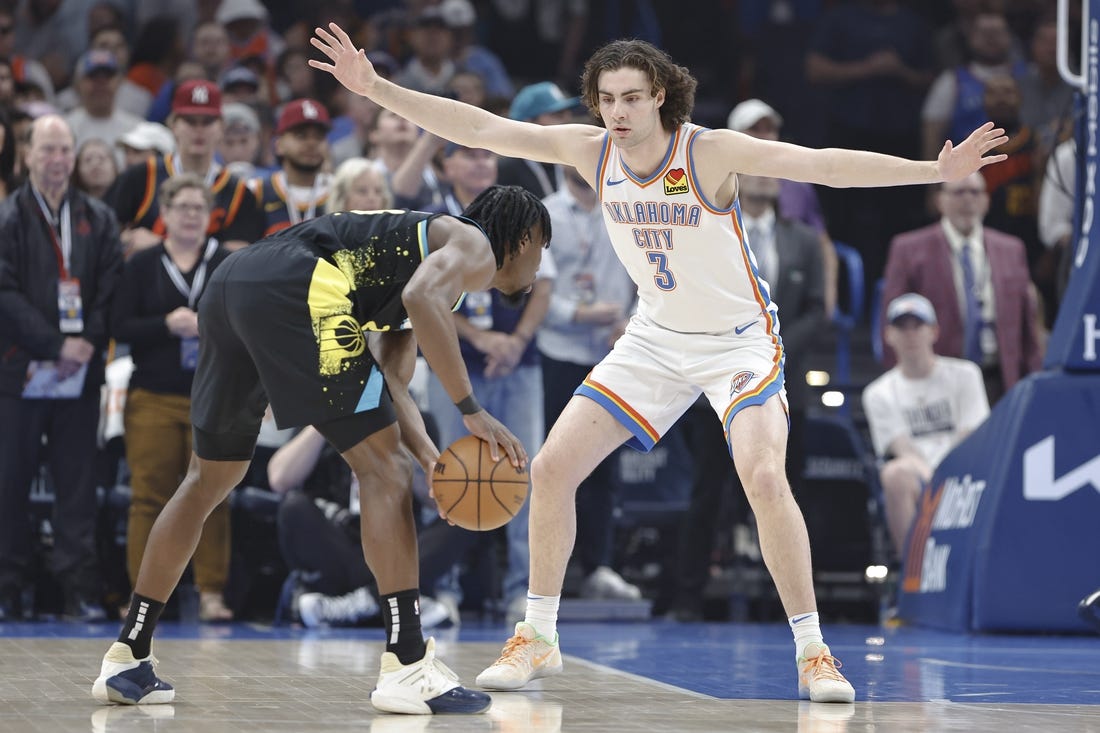 Mar 12, 2024; Oklahoma City, Oklahoma, USA; Oklahoma City Thunder guard Josh Giddey (3) defends Indiana Pacers forward Aaron Nesmith (23) during the first quarter at Paycom Center. Mandatory Credit: Alonzo Adams-USA TODAY Sports