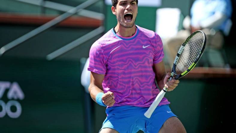 Carlos Alcaraz reacts during his fourth-round 6-3, 6-3 win against Fabian Marozsan at the BNP Paribas Open in Indian Wells, Calif., on Tues., March 12, 2024.