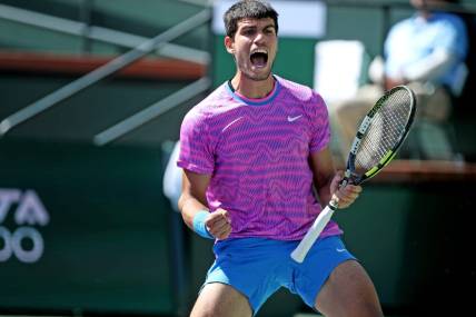 Carlos Alcaraz reacts during his fourth-round 6-3, 6-3 win against Fabian Marozsan at the BNP Paribas Open in Indian Wells, Calif., on Tues., March 12, 2024.