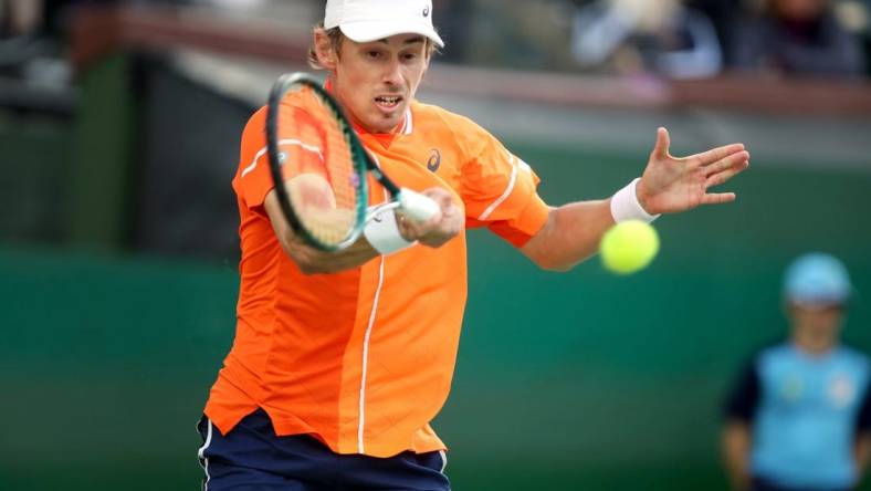 Alex de Minaur returns to Alexander Zverev during their fourth-round match at the BNP Paribas Open in Indian Wells, Calif., on Tues., March 12, 2024. Zverev won.