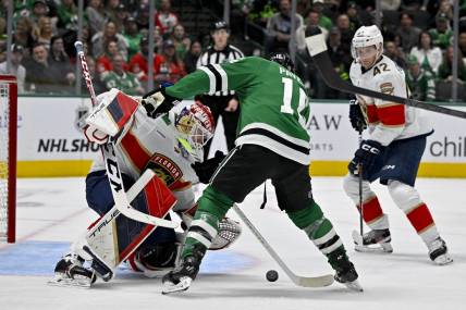 Mar 12, 2024; Dallas, Texas, USA; Dallas Stars center Joe Pavelski (16) attempts to poke the puck past Florida Panthers goaltender Sergei Bobrovsky (72) during the second period at the American Airlines Center. Mandatory Credit: Jerome Miron-USA TODAY Sports