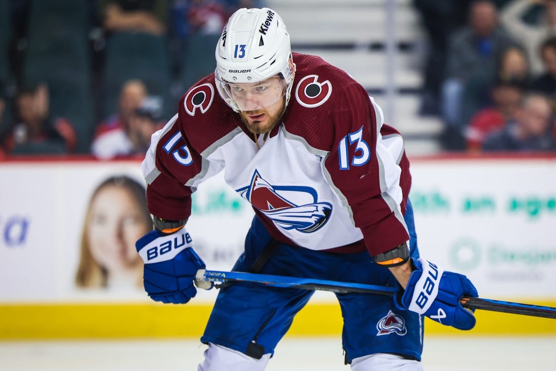 Mar 12, 2024; Calgary, Alberta, CAN; Colorado Avalanche right wing Valeri Nichushkin (13) during the face off against the Calgary Flames during the third period at Scotiabank Saddledome. Mandatory Credit: Sergei Belski-USA TODAY Sports