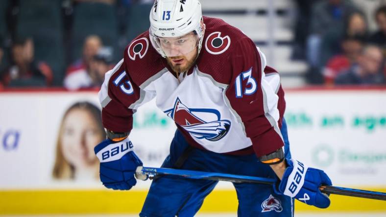 Mar 12, 2024; Calgary, Alberta, CAN; Colorado Avalanche right wing Valeri Nichushkin (13) during the face off against the Calgary Flames during the third period at Scotiabank Saddledome. Mandatory Credit: Sergei Belski-USA TODAY Sports