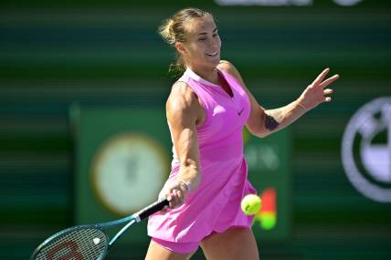 Mar 13, 2024; Indian Wells, CA, USA; Aryna Sabalenka (RUS) hits a shot as she was defeated in the fourth round by Emma Navarro (USA) in the BNP Paribas Open at the Indian Wells Tennis Garden. Mandatory Credit: Jayne Kamin-Oncea-USA TODAY Sports
