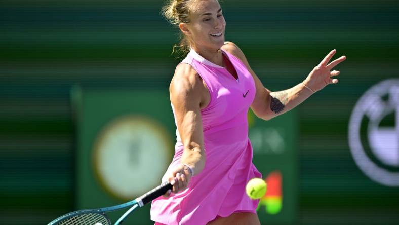 Mar 13, 2024; Indian Wells, CA, USA; Aryna Sabalenka (RUS) hits a shot as she was defeated in the fourth round by Emma Navarro (USA) in the BNP Paribas Open at the Indian Wells Tennis Garden. Mandatory Credit: Jayne Kamin-Oncea-USA TODAY Sports