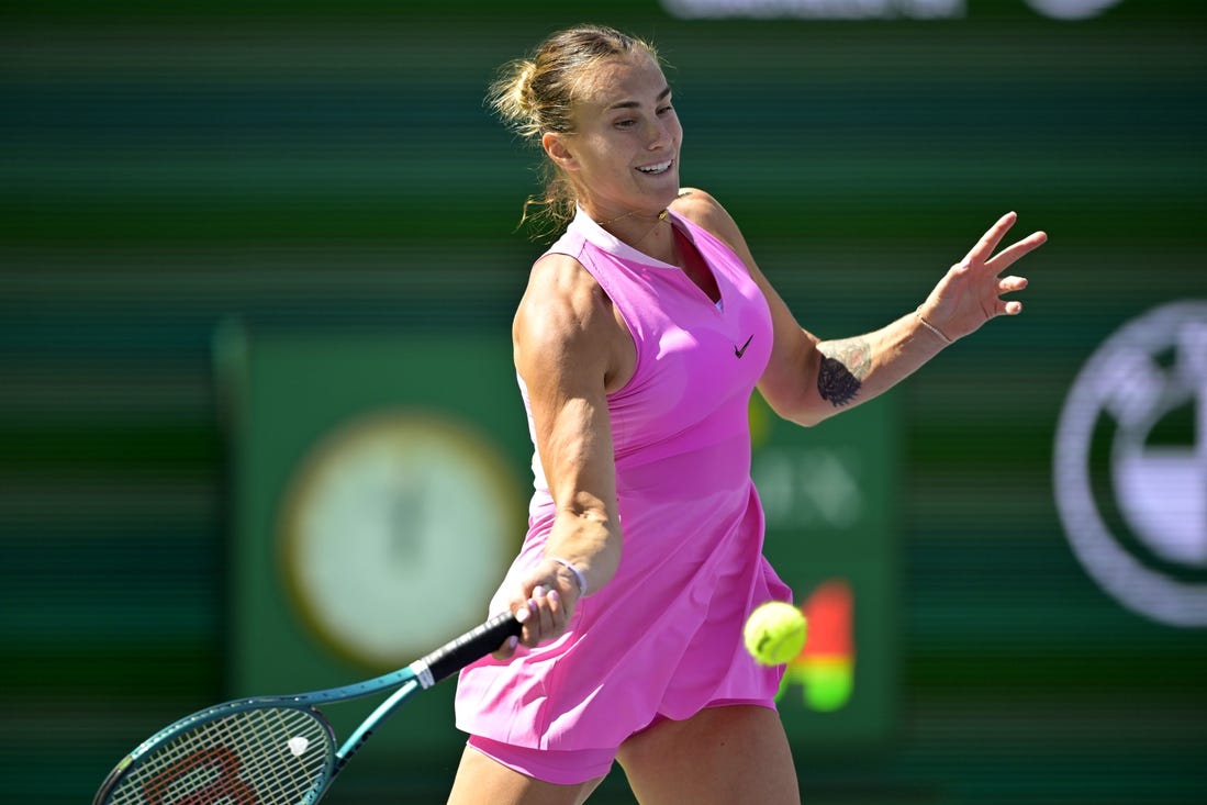 Mar 13, 2024; Indian Wells, CA, USA; Aryna Sabalenka (RUS) hits a shot as she was defeated in the fourth round by Emma Navarro (USA) in the BNP Paribas Open at the Indian Wells Tennis Garden. Mandatory Credit: Jayne Kamin-Oncea-USA TODAY Sports