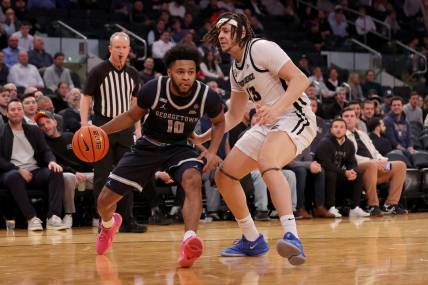 Mar 13, 2024; New York City, NY, USA; Georgetown Hoyas guard Jayden Epps (10) drives to the basket against Providence Friars forward Josh Oduro (13) during the first half at Madison Square Garden. Mandatory Credit: Brad Penner-USA TODAY Sports