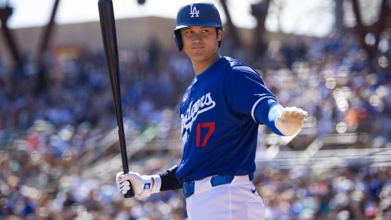 Mar 13, 2024; Phoenix, Arizona, USA; Los Angeles Dodgers designated hitter Shohei Ohtani against the Seattle Mariners during a spring training game at Camelback Ranch-Glendale. Mandatory Credit: Mark J. Rebilas-USA TODAY Sports