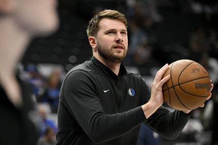 Mar 13, 2024; Dallas, Texas, USA; Dallas Mavericks guard Luka Doncic (77) warms up before the game between the Dallas Mavericks and the Golden State Warriors at the American Airlines Center. Mandatory Credit: Jerome Miron-USA TODAY Sports