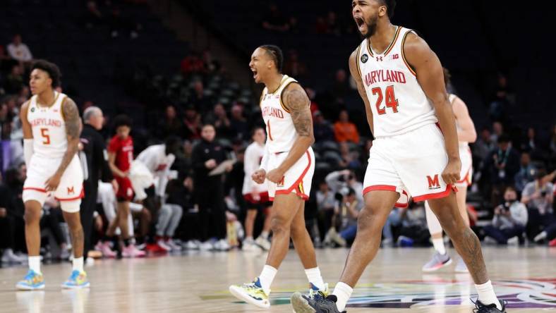 Mar 13, 2024; Minneapolis, MN, USA; Maryland Terrapins forward Donta Scott (24) celebrates his shot against the Rutgers Scarlet Knights during the first half at Target Center. Mandatory Credit: Matt Krohn-USA TODAY Sports