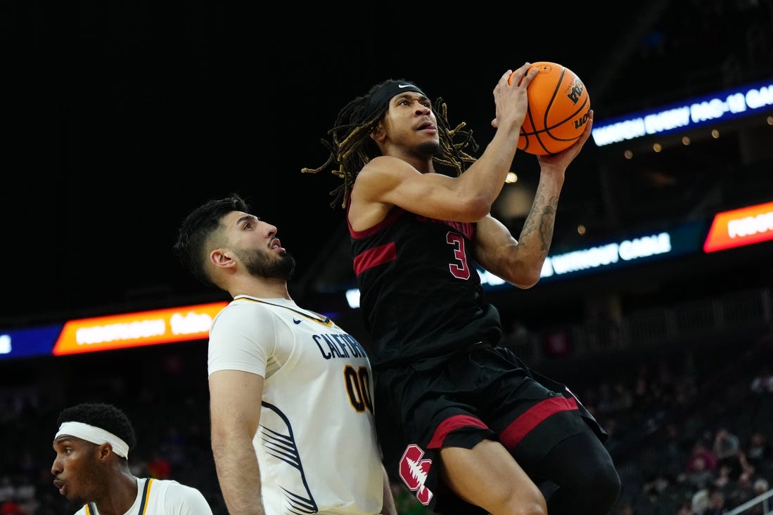 Mar 13, 2024; Las Vegas, NV, USA; Stanford Cardinal guard Kanaan Carlyle (3) shoots the ball against California Golden Bears forward Fardaws Aimaq (00) in the first half at T-Mobile Arena. Mandatory Credit: Kirby Lee-USA TODAY Sports