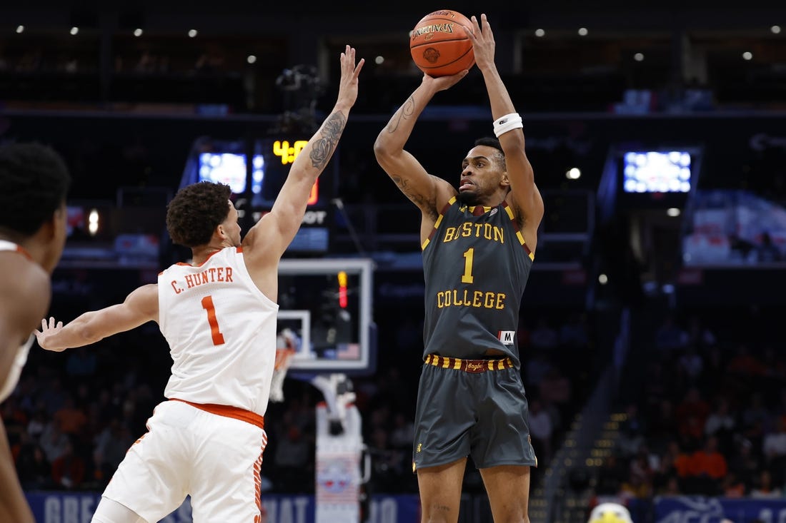 Mar 13, 2024; Washington, D.C., USA; Boston College Eagles guard Claudell Harris Jr. (1) shoots the ball over Clemson Tigers guard Chase Hunter (1) in the first half at Capital One Arena. Mandatory Credit: Geoff Burke-USA TODAY Sports