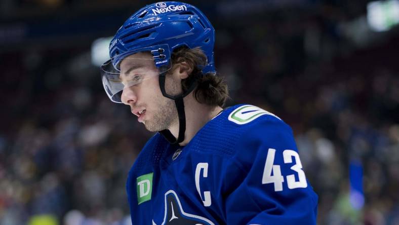 Mar 13, 2024; Vancouver, British Columbia, CAN; Vancouver Canucks defenseman Quinn Hughes (43) skates during warm up prior to a game against the Colorado Avalanche at Rogers Arena. Mandatory Credit: Bob Frid-USA TODAY Sports