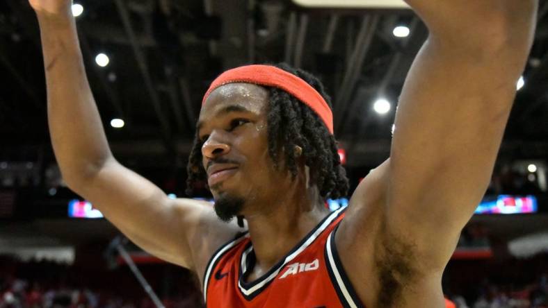 Mar 8, 2024; Dayton, Ohio, USA;  Dayton Flyers forward DaRon Holmes II (15) celebrates after defeating the Virginia Commonwealth Rams in overtime at University of Dayton Arena. Mandatory Credit: Matt Lunsford-USA TODAY Sports