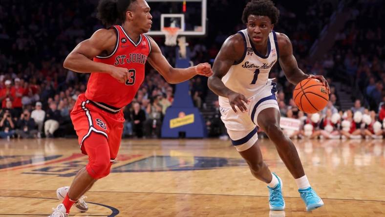 Mar 14, 2024; New York City, NY, USA; Seton Hall Pirates guard Kadary Richmond (1) drives to the basket against St. John's Red Storm guard Jordan Dingle (3) during the second half at Madison Square Garden. Mandatory Credit: Brad Penner-USA TODAY Sports