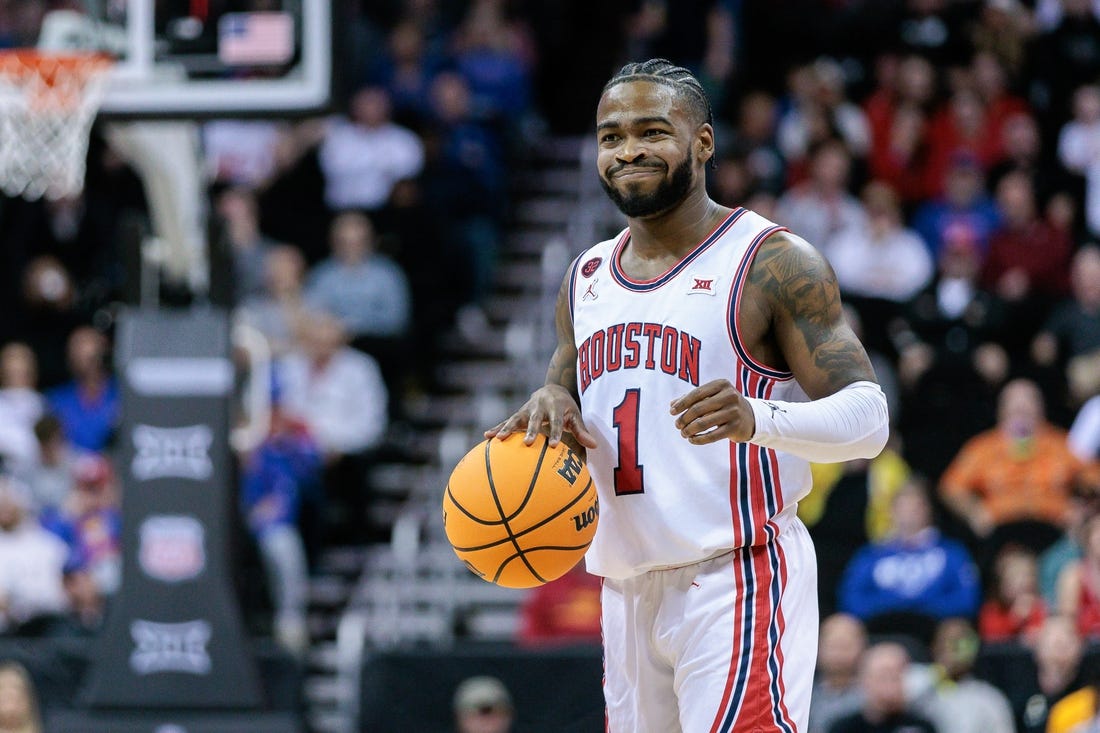 Mar 14, 2024; Kansas City, MO, USA; Houston Cougars guard Jamal Shead (1) brings the ball up court during the first half against the TCU Horned Frogs at T-Mobile Center. Mandatory Credit: William Purnell-USA TODAY Sports