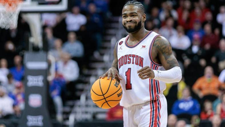 Mar 14, 2024; Kansas City, MO, USA; Houston Cougars guard Jamal Shead (1) brings the ball up court during the first half against the TCU Horned Frogs at T-Mobile Center. Mandatory Credit: William Purnell-USA TODAY Sports