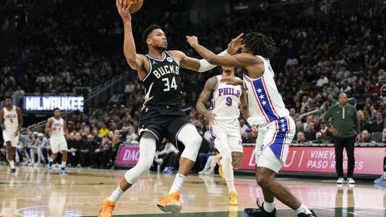 Mar 14, 2024; Milwaukee, Wisconsin, USA;  Milwaukee Bucks forward Giannis Antetokounmpo (34) drives for the basket during the first quarter against the Philadelphia 76ers at Fiserv Forum. Mandatory Credit: Jeff Hanisch-USA TODAY Sports