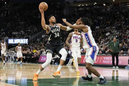 Mar 14, 2024; Milwaukee, Wisconsin, USA;  Milwaukee Bucks forward Giannis Antetokounmpo (34) drives for the basket during the first quarter against the Philadelphia 76ers at Fiserv Forum. Mandatory Credit: Jeff Hanisch-USA TODAY Sports