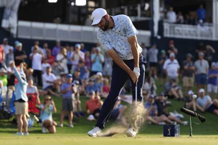 Scottie Scheffler tees off on hole 17 during the first round of The Players Championship PGA golf tournament Thursday, March 14, 2024 at TPC Sawgrass in Ponte Vedra Beach, Fla.