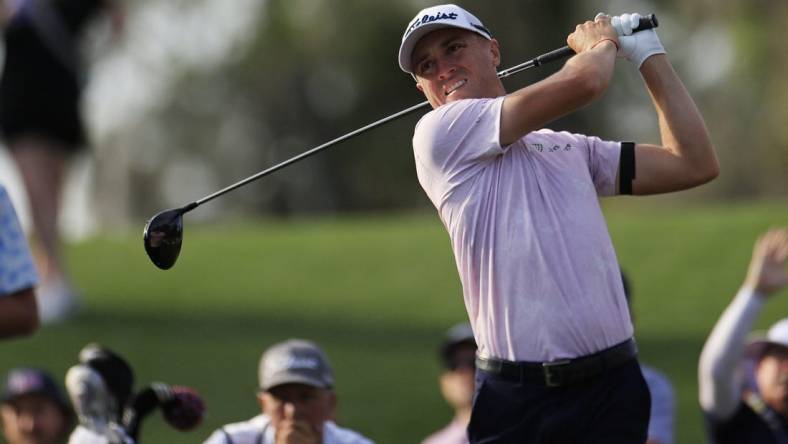 Justin Thomas plays his shot from the 16th tee during the first round of The Players Championship PGA golf tournament Thursday, March 14, 2024 at TPC Sawgrass in Ponte Vedra Beach, Fla.