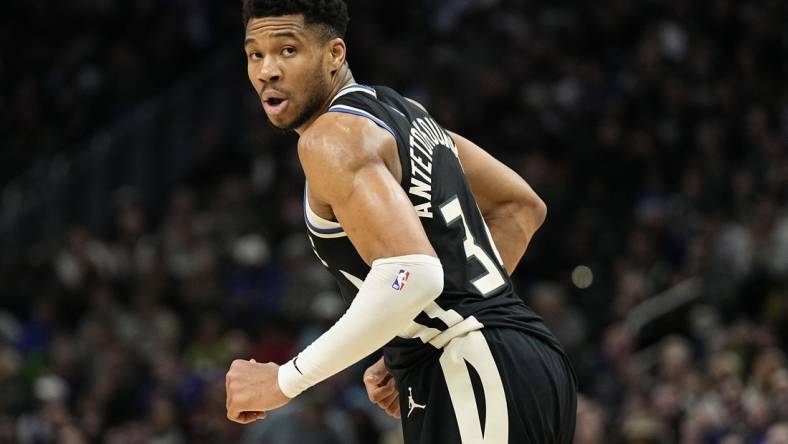 Mar 14, 2024; Milwaukee, Wisconsin, USA;  Milwaukee Bucks forward Giannis Antetokounmpo (34) looks over his shoulder during the second quarter against the Philadelphia 76ers at Fiserv Forum. Mandatory Credit: Jeff Hanisch-USA TODAY Sports