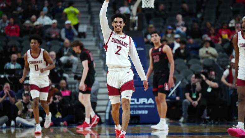 Mar 14, 2024; Las Vegas, NV, USA; Washington State Cougars guard Myles Rice (2) celebrates in the first half against the Stanford Cardinal at T-Mobile Arena. Mandatory Credit: Kirby Lee-USA TODAY Sports