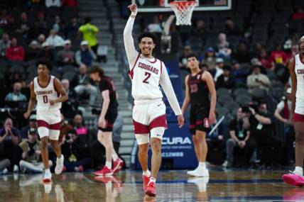 Mar 14, 2024; Las Vegas, NV, USA; Washington State Cougars guard Myles Rice (2) celebrates in the first half against the Stanford Cardinal at T-Mobile Arena. Mandatory Credit: Kirby Lee-USA TODAY Sports