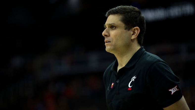 Cincinnati Bearcats head coach Wes Miller looks on in the second half of the Big 12 Conference tournament game between Cincinnati Bearcats and Baylor Bears at T-Mobile Center in Kansas City, Mo., on Thursday, March 14, 2024.