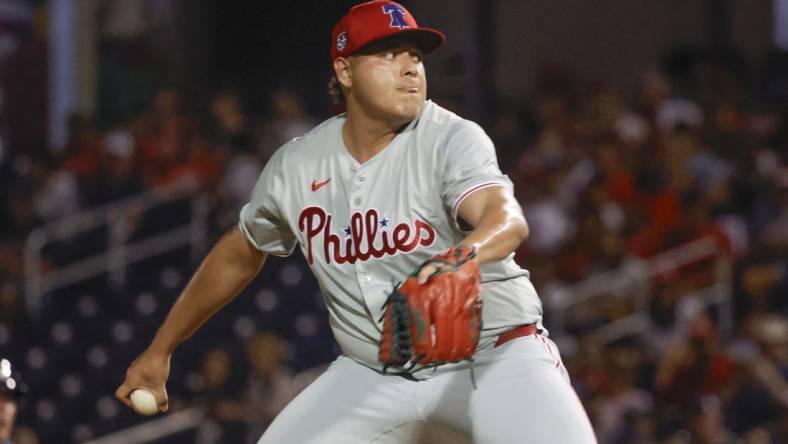 Mar 15, 2024; West Palm Beach, Florida, USA; Philadelphia Phillies relief pitcher Luis Ortiz (56) throws a pitch during the seventh inning against the Houston Astros at The Ballpark of the Palm Beaches. Mandatory Credit: Reinhold Matay-USA TODAY Sports