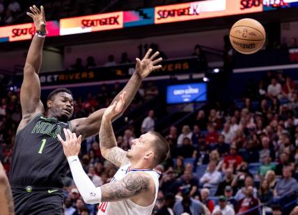 Mar 15, 2024; New Orleans, Louisiana, USA;  New Orleans Pelicans forward Zion Williamson (1) is fouled by LA Clippers center Daniel Theis (10) during the first half at Smoothie King Center. Mandatory Credit: Stephen Lew-USA TODAY Sports