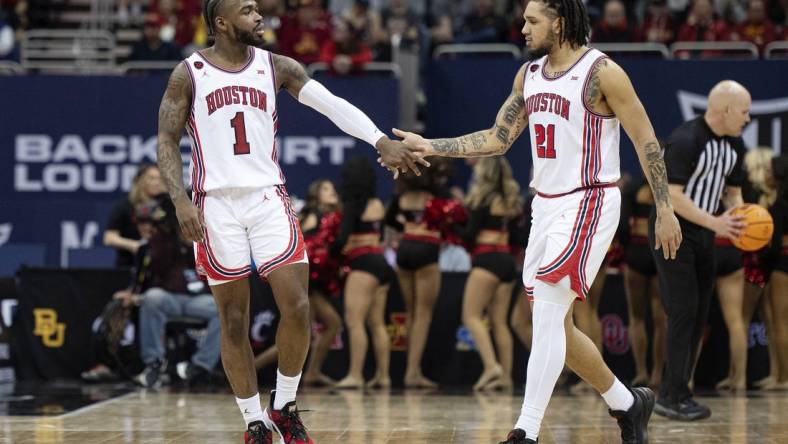 Mar 15, 2024; Kansas City, MO, USA; Houston Cougars guard Jamal Shead (1) celebrates with guard Emanuel Sharp (21) in the second half against the Texas Tech Red Raiders at T-Mobile Center. Mandatory Credit: Amy Kontras-USA TODAY Sports