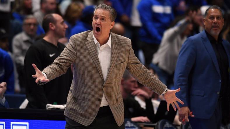 Mar 15, 2024; Nashville, TN, USA; Kentucky Wildcats head coach John Calipari reacts on the sideline during the second half against the Texas A&M Aggies at Bridgestone Arena. Mandatory Credit: Christopher Hanewinckel-USA TODAY Sports