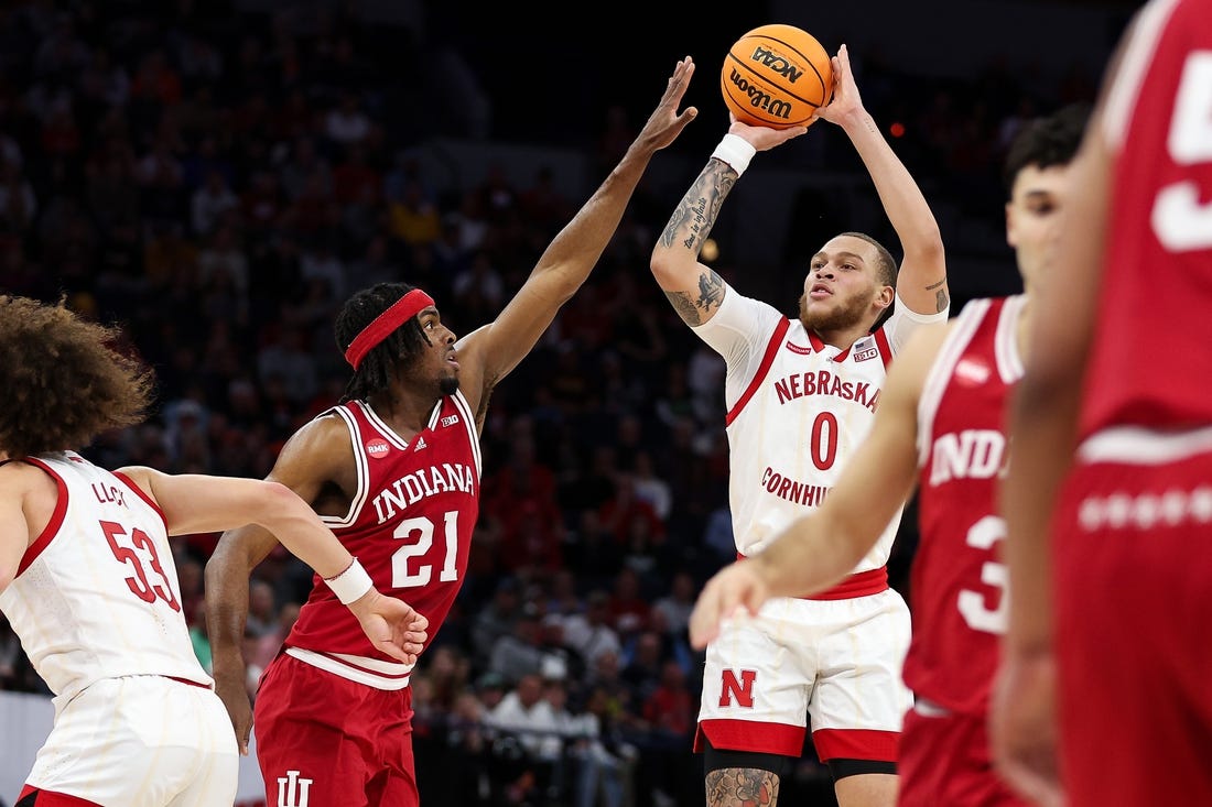 Mar 15, 2024; Minneapolis, MN, USA; Nebraska Cornhuskers guard C.J. Wilcher (0) shoots as Indiana Hoosiers forward Mackenzie Mgbako (21) defends during the first half at Target Center. Mandatory Credit: Matt Krohn-USA TODAY Sports