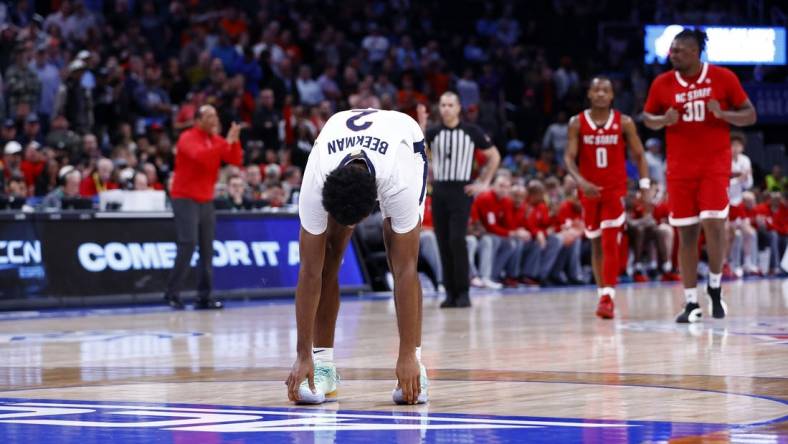 Mar 15, 2024; Washington, D.C., USA; Virginia Cavaliers guard Reece Beekman (2) reacts after missing two free throws in the second half against the North Carolina State Wolfpack at Capital One Arena. Mandatory Credit: Amber Searls-USA TODAY Sports