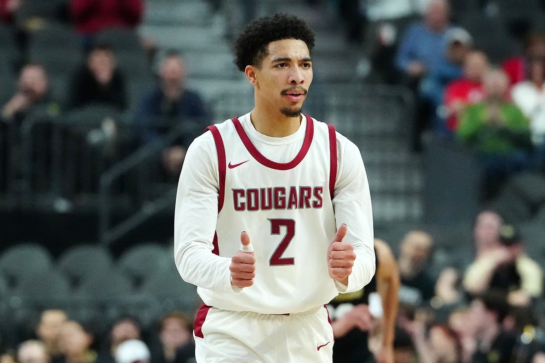 Mar 15, 2024; Las Vegas, NV, USA; Washington State Cougars guard Myles Rice (2) gestures after scoring against the Colorado Buffaloes during the first half at T-Mobile Arena. Mandatory Credit: Stephen R. Sylvanie-USA TODAY Sports