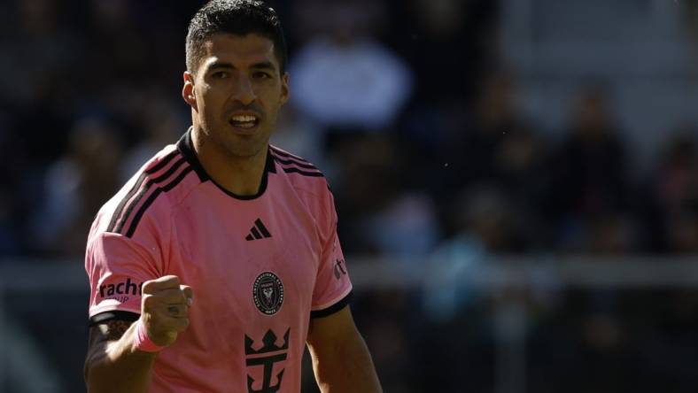 Mar 16, 2024; Washington, District of Columbia, USA; Inter Miami CF forward Luis Suarez (9) celebrates scoring a goal against D.C. United during the second half at Audi Field. Mandatory Credit: Geoff Burke-USA TODAY Sports