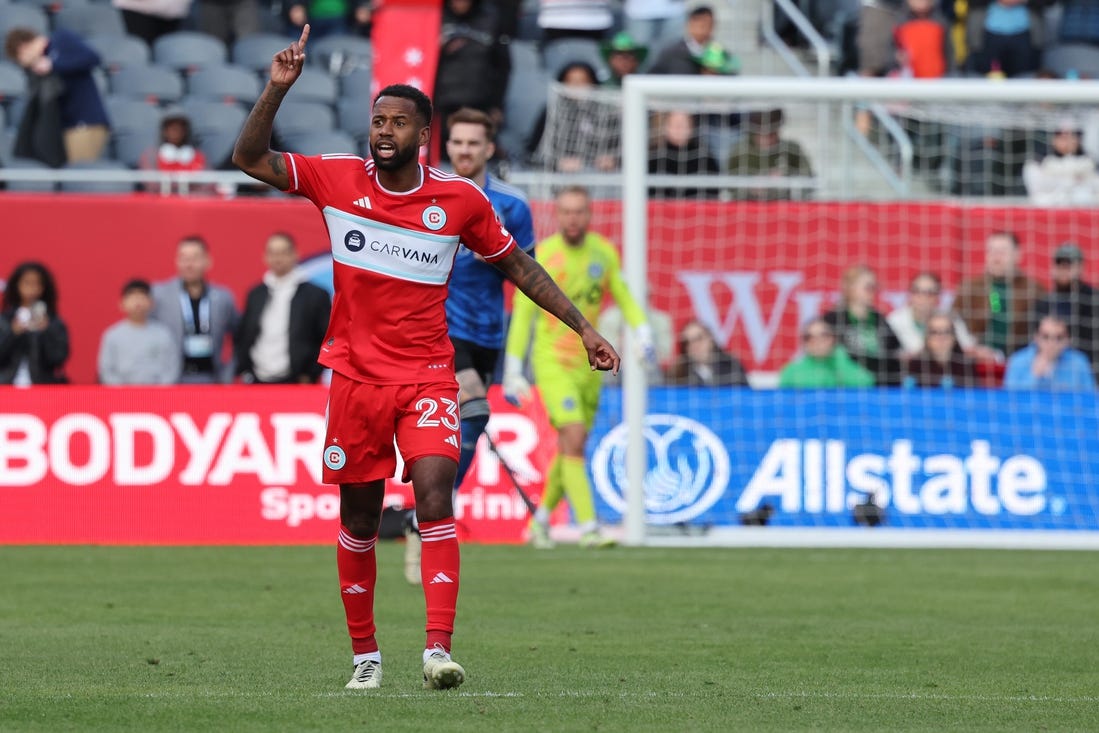 Mar 16, 2024; Chicago, Illinois, USA; Chicago Fire FC midfielder Kellyn Acosta (23) celebrates after scoring a goal on a long kick against CF Montreal during the second half at Soldier Field. Mandatory Credit: Mike Dinovo-USA TODAY Sports