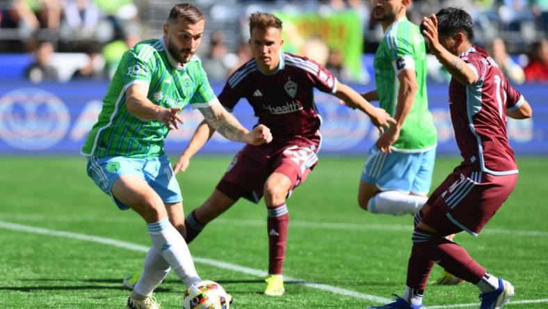 Mar 16, 2024; Seattle, Washington, USA; Seattle Sounders FC forward Jordan Morris (13) controls the ball during the second half against the Colorado Rapids at Lumen Field. Mandatory Credit: Steven Bisig-USA TODAY Sports