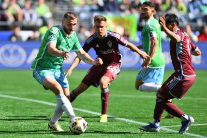 Mar 16, 2024; Seattle, Washington, USA; Seattle Sounders FC forward Jordan Morris (13) controls the ball during the second half against the Colorado Rapids at Lumen Field. Mandatory Credit: Steven Bisig-USA TODAY Sports