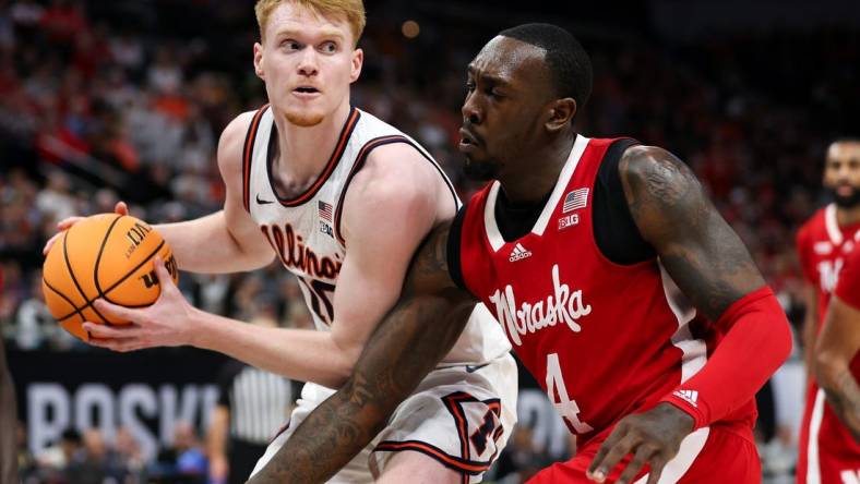 Mar 16, 2024; Minneapolis, MN, USA; Illinois Fighting Illini guard Luke Goode (10) controls the ball as Nebraska Cornhuskers forward Juwan Gary (4) defends during the first half at Target Center. Mandatory Credit: Matt Krohn-USA TODAY Sports