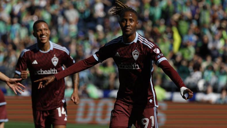 Mar 16, 2024; Seattle, Washington, USA; Colorado Rapids forward Kevin Cabral (91) celebrates scoring against Seattle Sounders FC during the second half against Seattle Sounders FC at Lumen Field. Mandatory Credit: Joe Nicholson-USA TODAY Sports