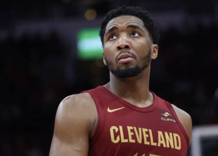 Mar 16, 2024; Houston, Texas, USA; Cleveland Cavaliers guard Donovan Mitchell (45) looks at the replay board while playing against the Houston Rockets  in the second half at Toyota Center. Mandatory Credit: Thomas Shea-USA TODAY Sports