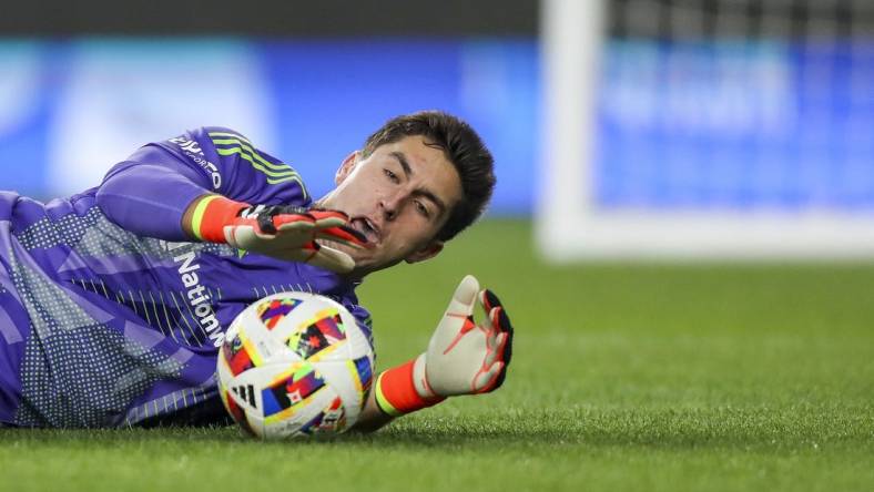 Mar 16, 2024; Columbus, Ohio, USA; Columbus Crew goalkeeper Patrick Schulte (28) makes a save against the New York Red Bulls in the first half at Lower.com Field. Mandatory Credit: Katie Stratman-USA TODAY Sports