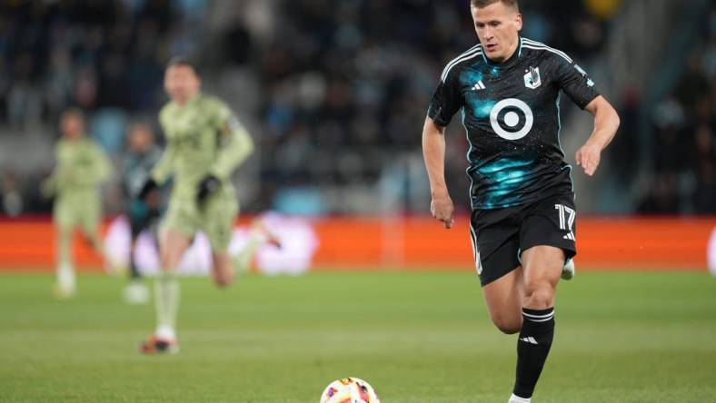 Mar 16, 2024; Saint Paul, Minnesota, USA; Minnesota United midfielder Robin Lod (17) plays the ball in the first half against LAFC at Allianz Field. Mandatory Credit: Matt Blewett-USA TODAY Sports