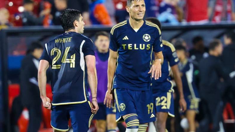 Mar 16, 2024; Frisco, Texas, USA; Vancouver Whitecaps FC forward Brian White (24) celebrates with Vancouver Whitecaps FC midfielder Damir Kreilach (19) after the game against FC Dallas at Toyota Stadium. Mandatory Credit: Kevin Jairaj-USA TODAY Sports