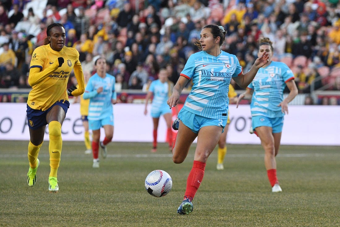 Mar 16, 2024; Sandy, Utah, USA;  Chicago Red Stars defender Sam Staab (3) controls the ball against Utah Royals FC forward Ify Onumonu (11) in the second half at America First Field. Mandatory Credit: Isaac Hale-USA TODAY Sports
