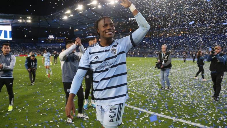 Mar 16, 2024; Kansas City, Kansas, USA; Sporting Kansas City defender Dany Rosero (5) celebrates with fans after defeating the San Jose Earthquakes at Children's Mercy Park. Mandatory Credit: Scott Sewell-USA TODAY Sports